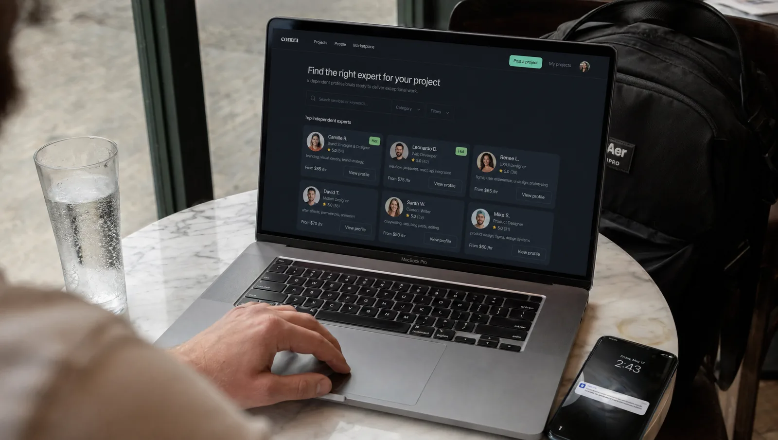 MacBook with B2B marketplace on a marble table